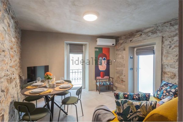 appartamento in affitto a Carate Urio