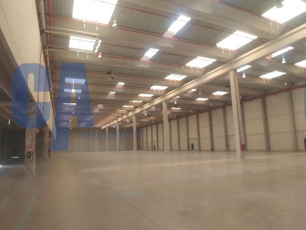 locale commerciale in affitto ad Arese in zona Valera