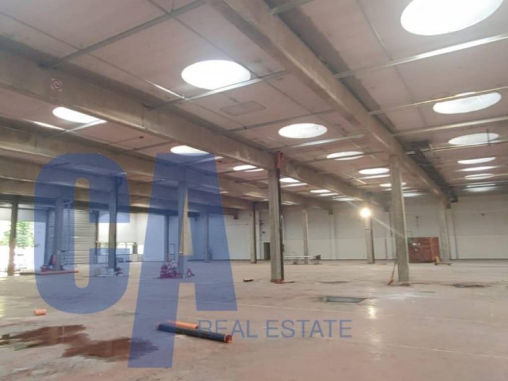 locale commerciale in affitto a Rodano