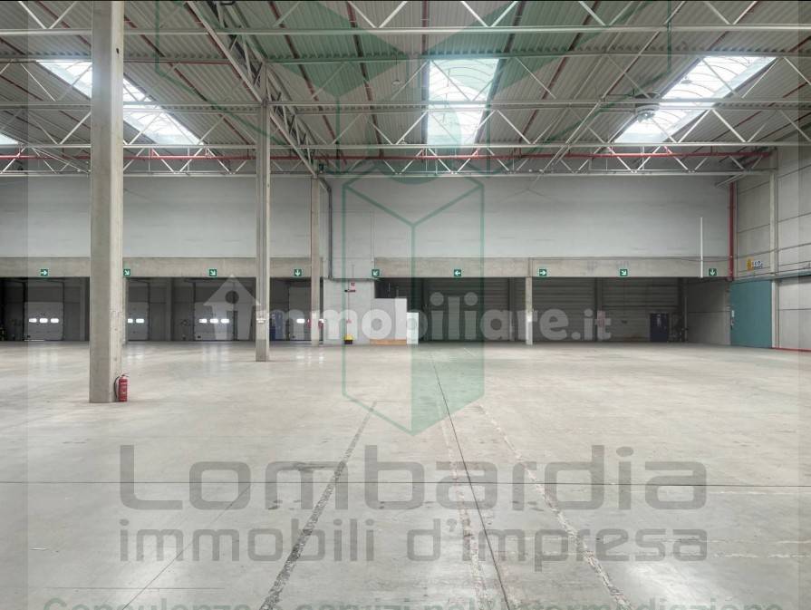 locale commerciale in affitto a Rodano