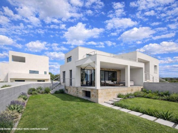 casa indipendente in vendita ad Arzachena in zona Abbiadori
