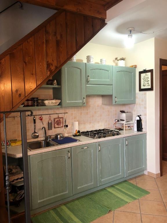 intera palazzina in vendita a Fiumalbo in zona Faidello